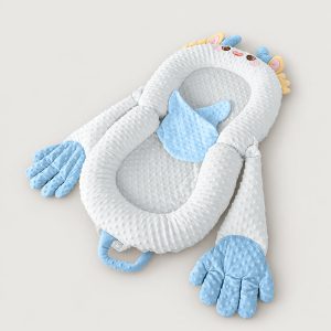 Blue dragon soothing patting Yorkie bed