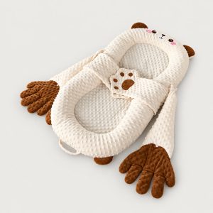 Brown bear soothing patting Yorkie bed